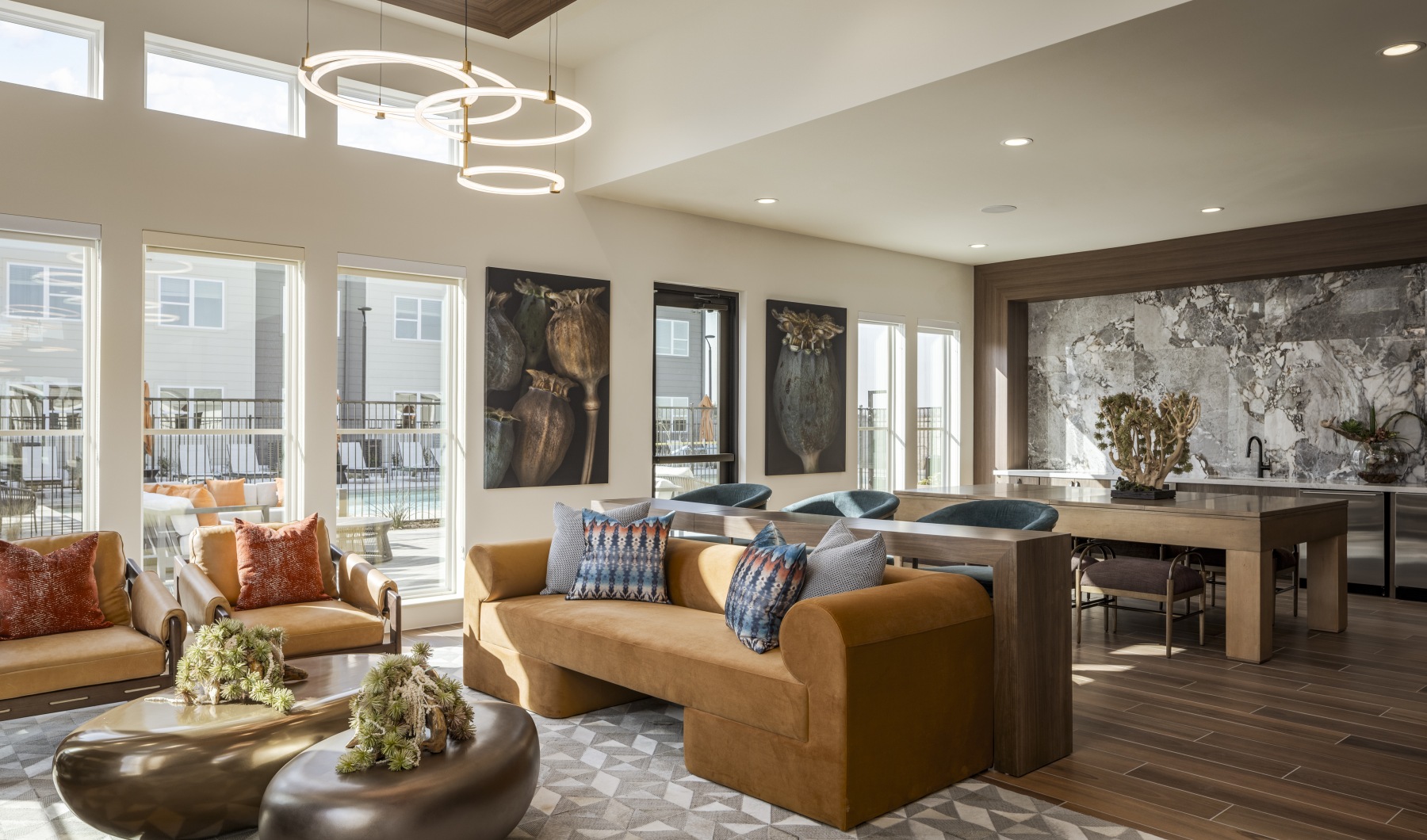 large well lit room with seating and tables 